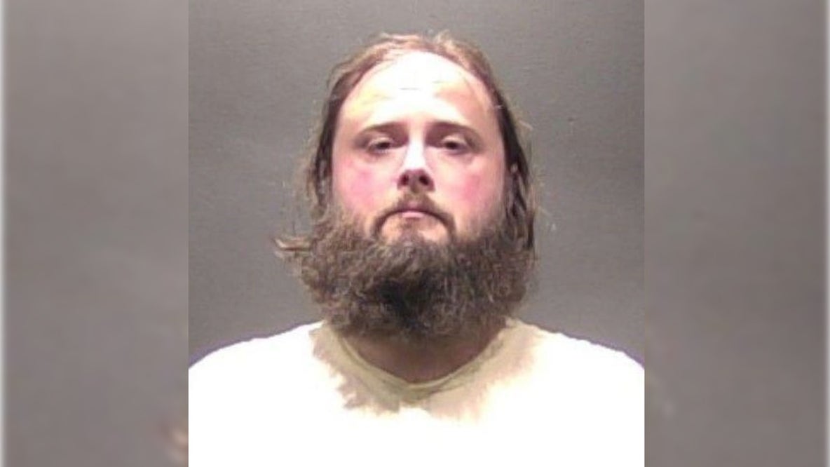 Man charged after suspicious death of woman found inside Falls Church hotel