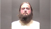 Man charged after woman found dead in Virginia hotel