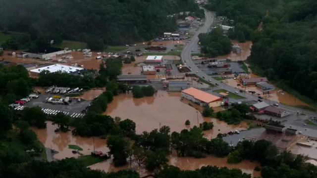 West Virginia flood recovery continues as crews remove hundreds of tons of debris