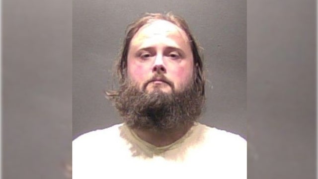 Man charged after suspicious death of woman found inside Falls Church hotel