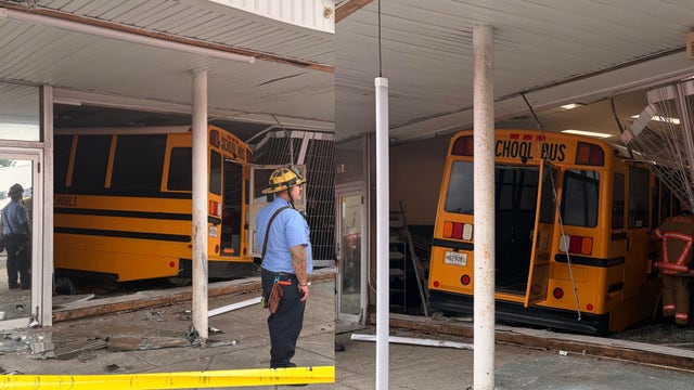 2 adults, 1 child injured after school bus crashes into Baltimore County building