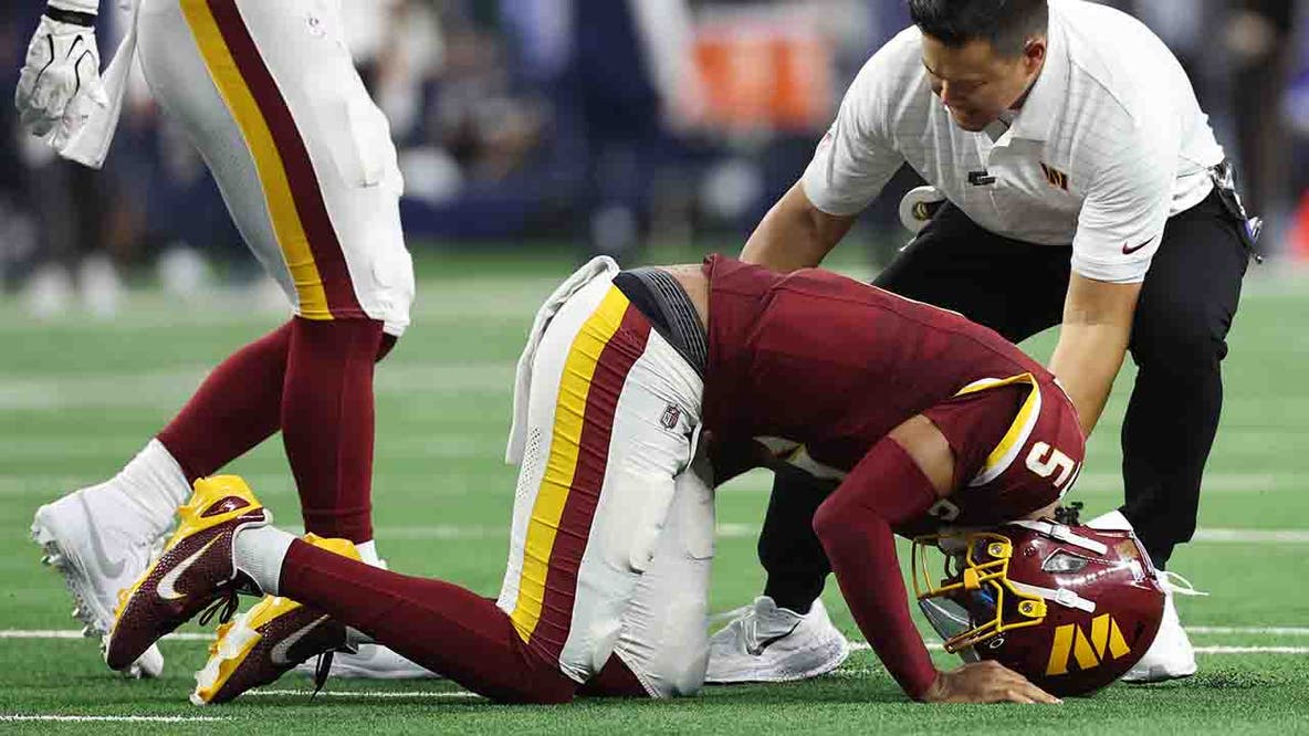 Jayden Daniels injury: Commanders QB dislocates left elbow again in loss to Cowboys