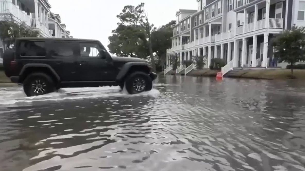DC area battered by gusty winds, coastal flooding as nor'easter churns north