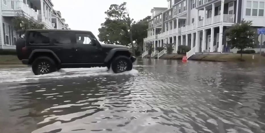 DC area battered by gusty winds, coastal flooding as nor'easter churns north