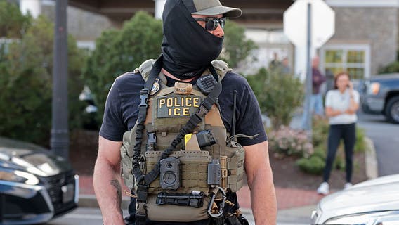 Justice Department sues Maryland and 2 counties over new law banning face coverings for officers