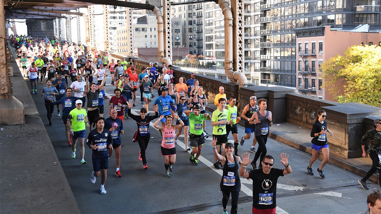New York City Marathon sets record with 52,000plus finishers