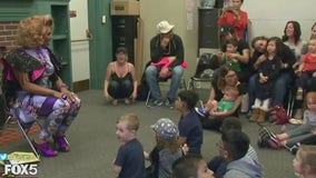 Drag queens with stories and songs for kids at the Queens Library