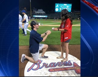 Braves Fans get engaged_1561745190826.JPEG-404959.jpg