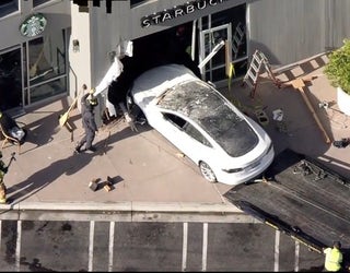 Tesla crash_1526000111217.PNG-405538.jpg
