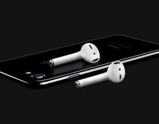 iPhone7-JetBlk-34BR_AirPods-Laydown-OB-PRINT_1473275726663.jpg