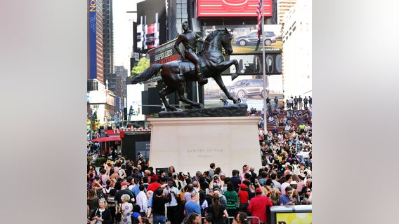 Artist Kehinde Wiley unveils bold sculpture in Times Square
