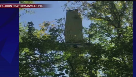 Pilot spends hours in treetops after small plane crashes