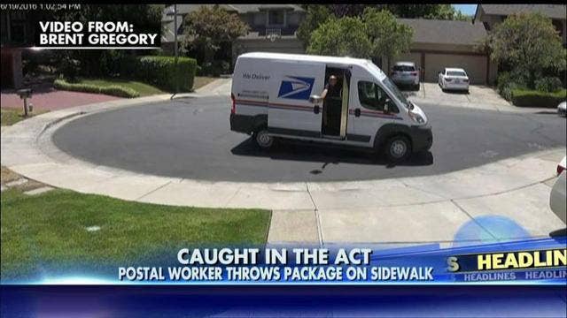 VIDEO: Postal worker tosses package onto sidewalk