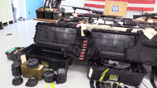 School threat leads to weapons bust