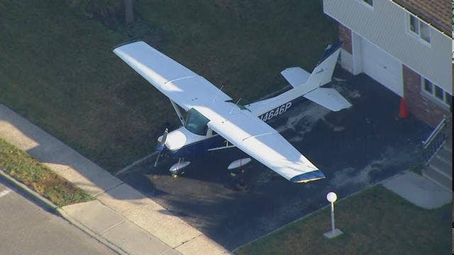 Man parks plane in driveway