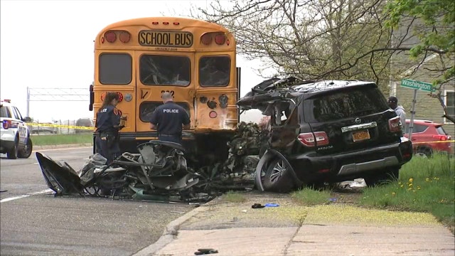 SUV crushed in collision with school bus