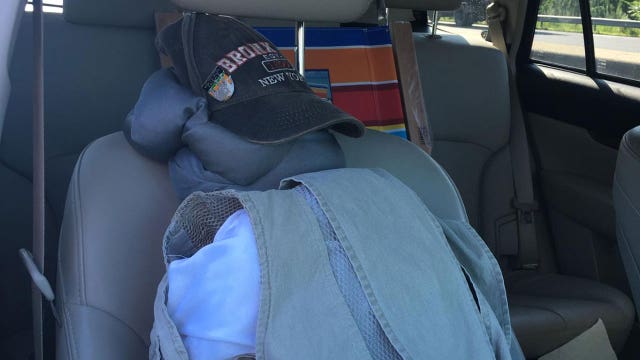 Woman uses dummy passenger with briefcase in carpool lane