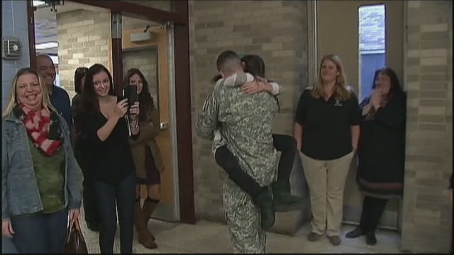 Returning soldier surprises little sister at school
