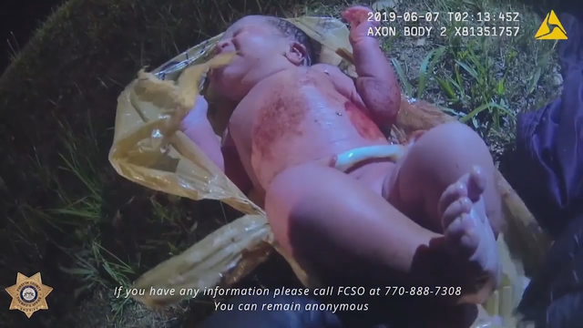 Body-cam video released of baby found abandoned in woods