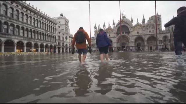 Venice wading through historically high water levels