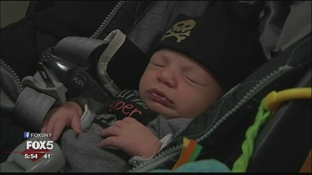 Parents and baby, all delivered by same doctor