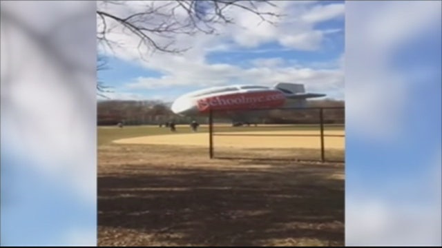 Blimp goes down near LI school