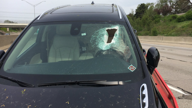 Concrete crashes through windshield, knocks driver unconscious