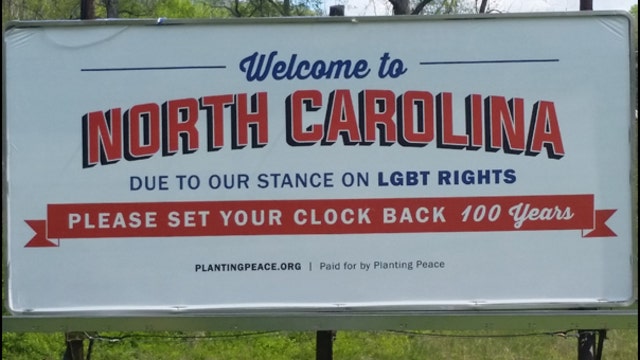 Billboard on NC highway asks drivers to set 'clock back 100 years'