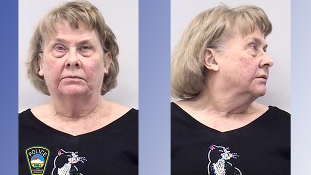 Woman wearing cat shirt tried to poison neighbor's dog