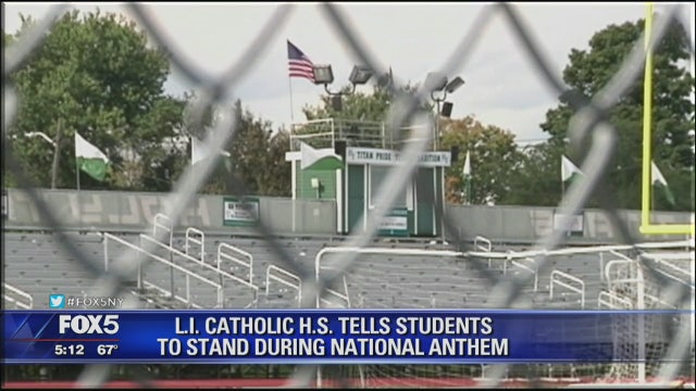 Catholice students told to stand for National Anthem