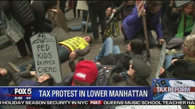 New York lawmaker takes part in 'die-in' over tax plan