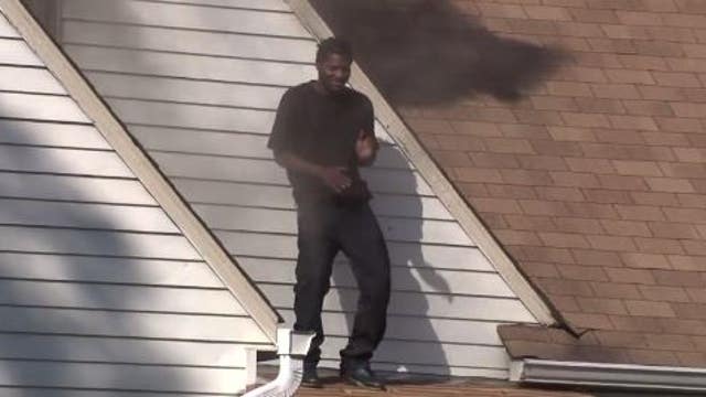 Indiana man allegedly lights ex-girlfriend's house on fire, then dances on roof