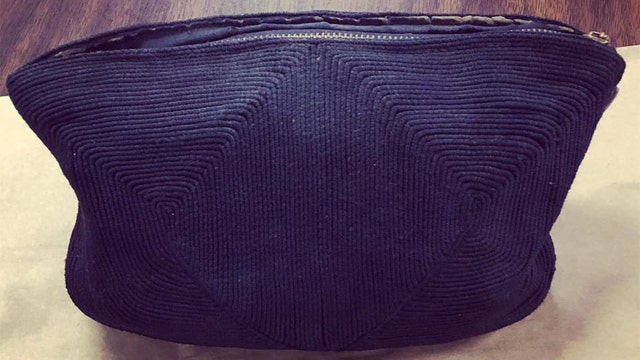 Purse to be returned to woman who lost it at school in 1954