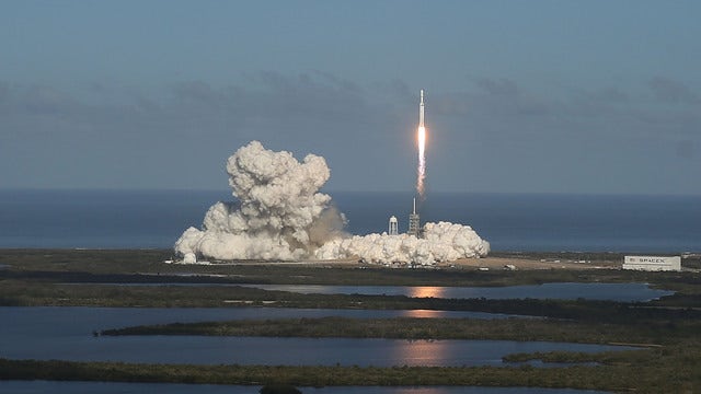 SpaceX says it will fly private passenger 'around the Moon'