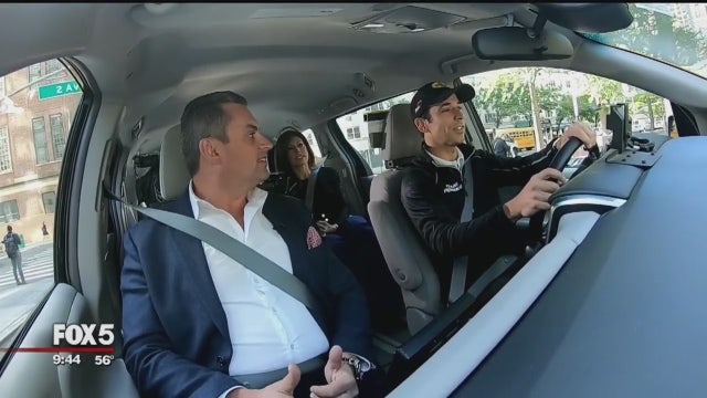 Racing legend Helio Castroneves tries driving a taxi