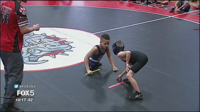 9-year-old wrestler with no legs continues to inspire
