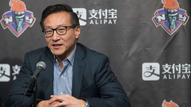 Tsai completes purchase of Nets, arena, hires Levy as CEO
