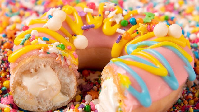 $1 gets you a dozen doughnuts for Krispy Kreme birthday celebration
