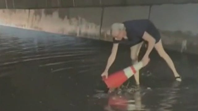 With the LIE flooding, Brooklyn woman takes matters into her own hands to drain the water