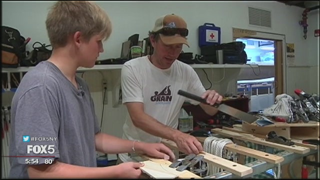 Building wooden surfboards by hand