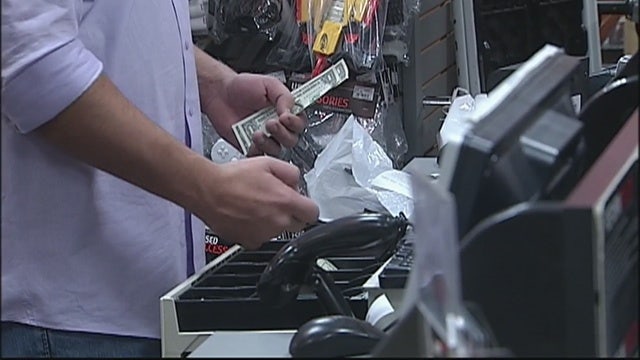 Cuomo signs $15 minimum wage law