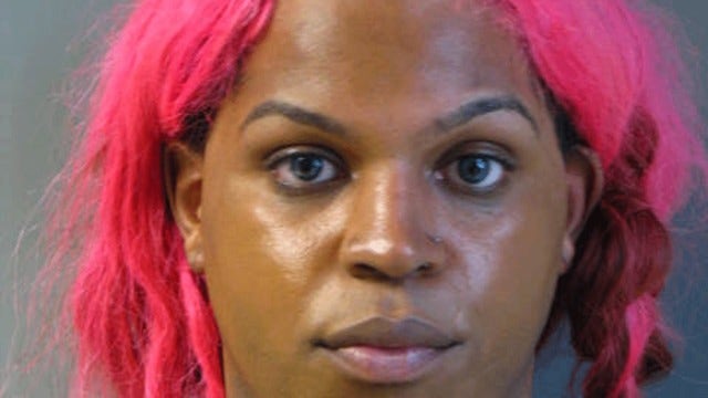 Motel guest spots pink-haired suspect