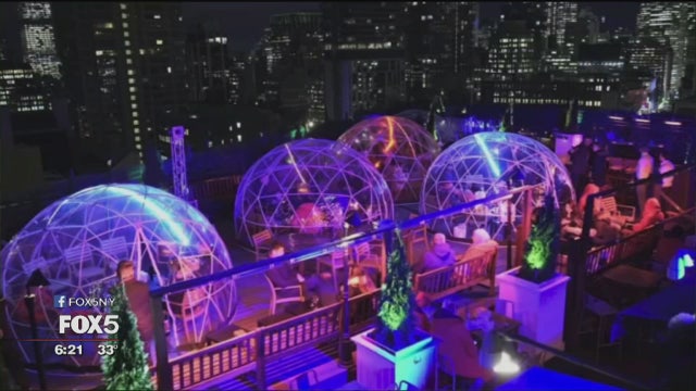 An igloo and a hot toddy will keep you warm at a rooftop bar this winter