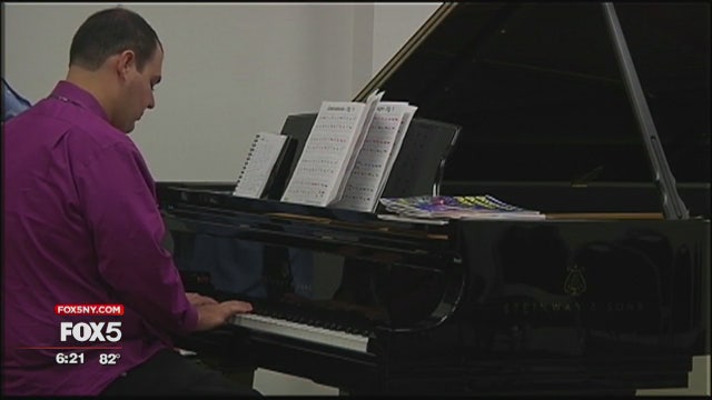 Playing piano brings focus and joy to Long Island man with autism