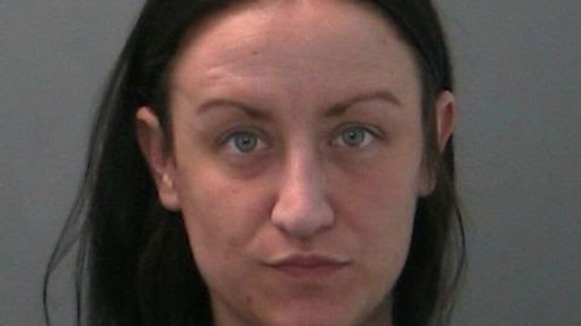 Woman accused of robbing people at cemeteries