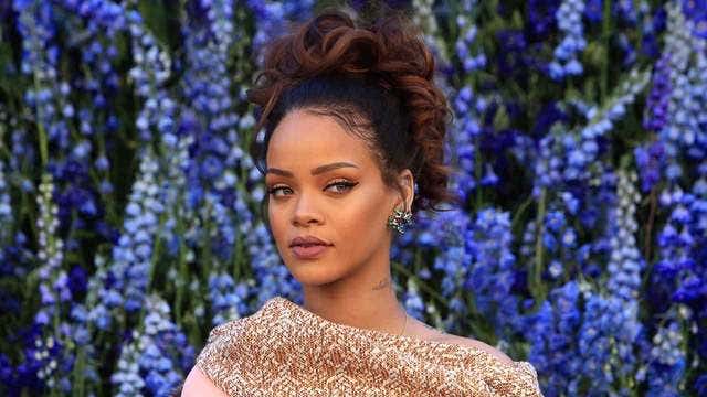 Rihanna sues her father over use of their last name