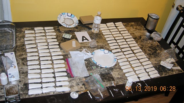 Cops seize drugs, guns, cash in narcotics ring bust