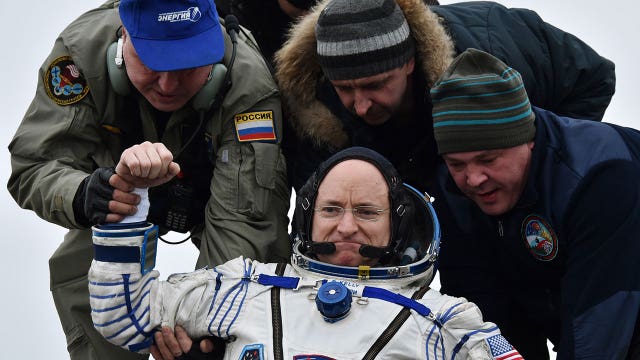 Astronaut Scott Kelly returns to Earth after year in space