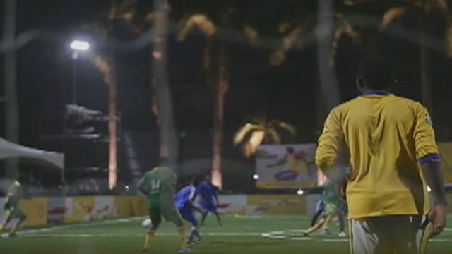 Akon behind soccer field powered by sun
