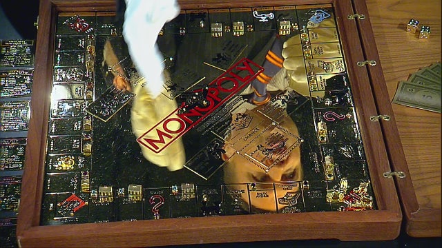 Solid gold monopoly set on display